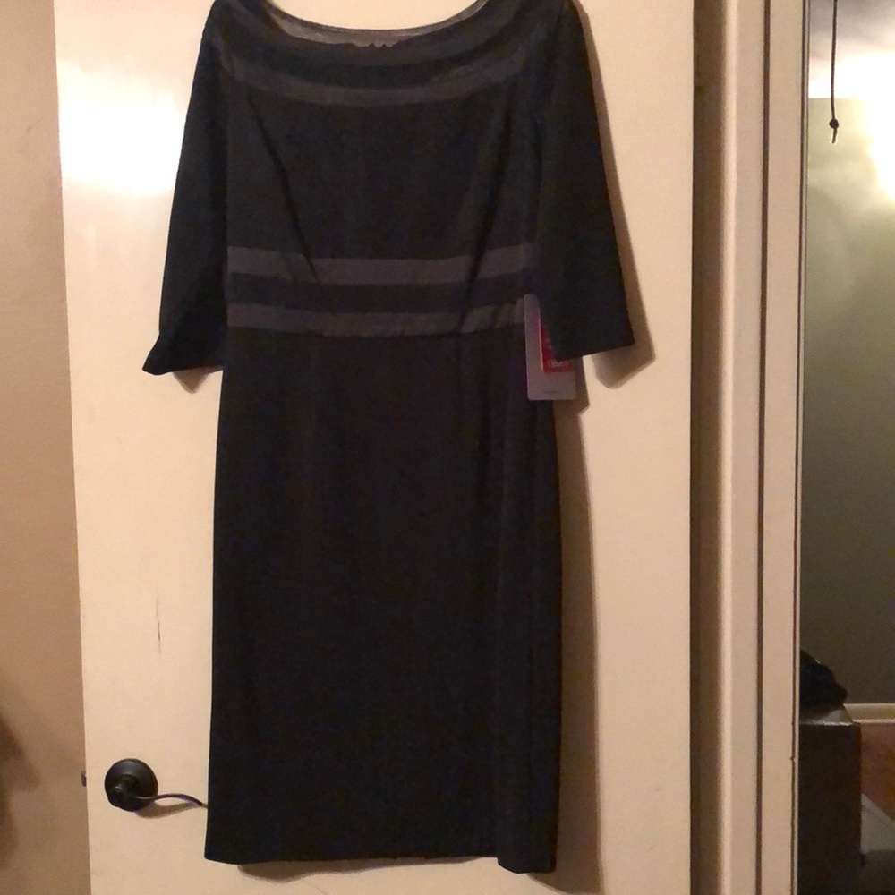 A black party dress the dress fits about 2 inches below the knee I’m 5’5